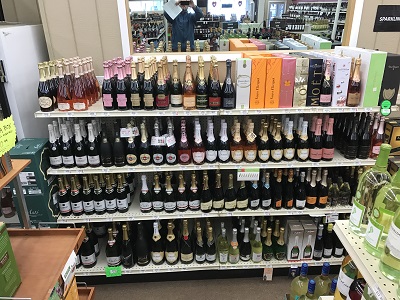 photo of sparkling wine on a shelf at Basin Wine