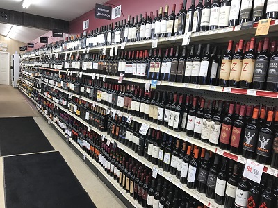 photo of wine bottles on a shelf